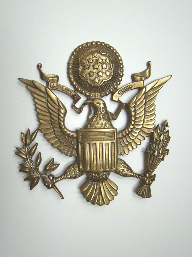A brass U.S. ARMY Shield measuring 8 1/2" by 8", 20th century